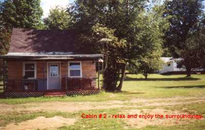 2 bedrooms, sleep loft, full kitchen, living room and covered front porch.