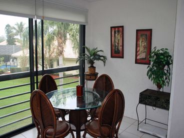 Living area Lanai (right side) On the lake with full views of lake and sunsets!.