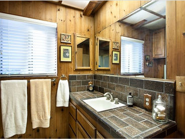 The master bath has a combo bathtub/shower